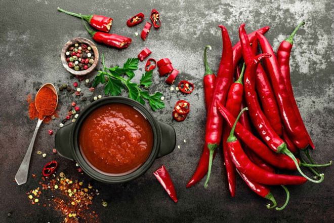 Picture 2 of Some people eat chilies and find it