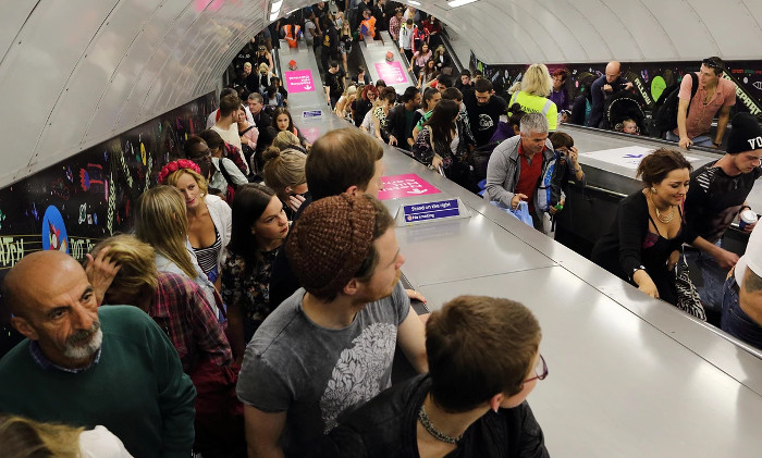 Picture 1 of Standing still will make people move faster than escalating escalators