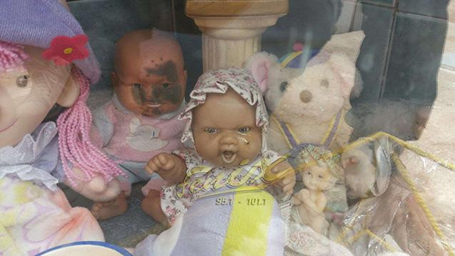 Picture 1 of Strange story about dolls lying in the grave crying