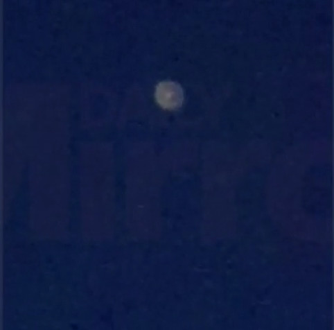Picture 1 of Suspicious alien ship object hovering over British city