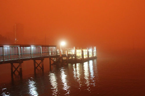 Picture 6 of Sydney is red because of the unusual sandstorm