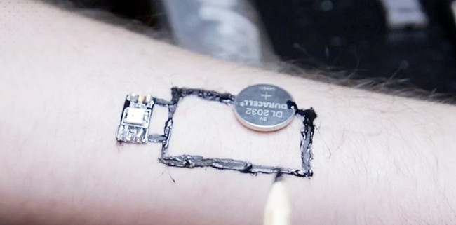 Picture 3 of Tattoos electrical circuits on the skin to form sensors that monitor temperature and blood pressure