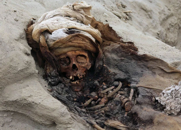 Picture 3 of Terrible mass grave of 227 sacrificed children