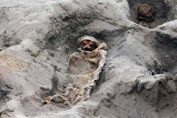 Picture 6 of Terrible mass grave of 227 sacrificed children