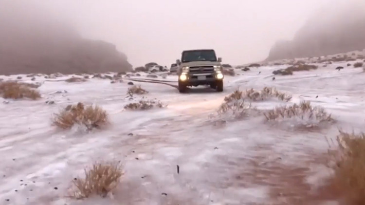 Picture 1 of The Arabian desert turned into a white snow field