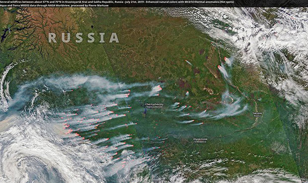 Picture 2 of The Arctic is burning very strongly and the fire is so big that it can be seen from outer space