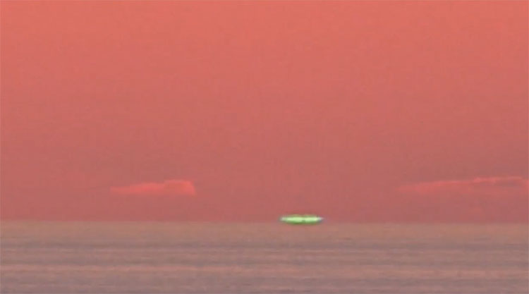 Picture 1 of The blue halo appears when the Sun sets on the sea
