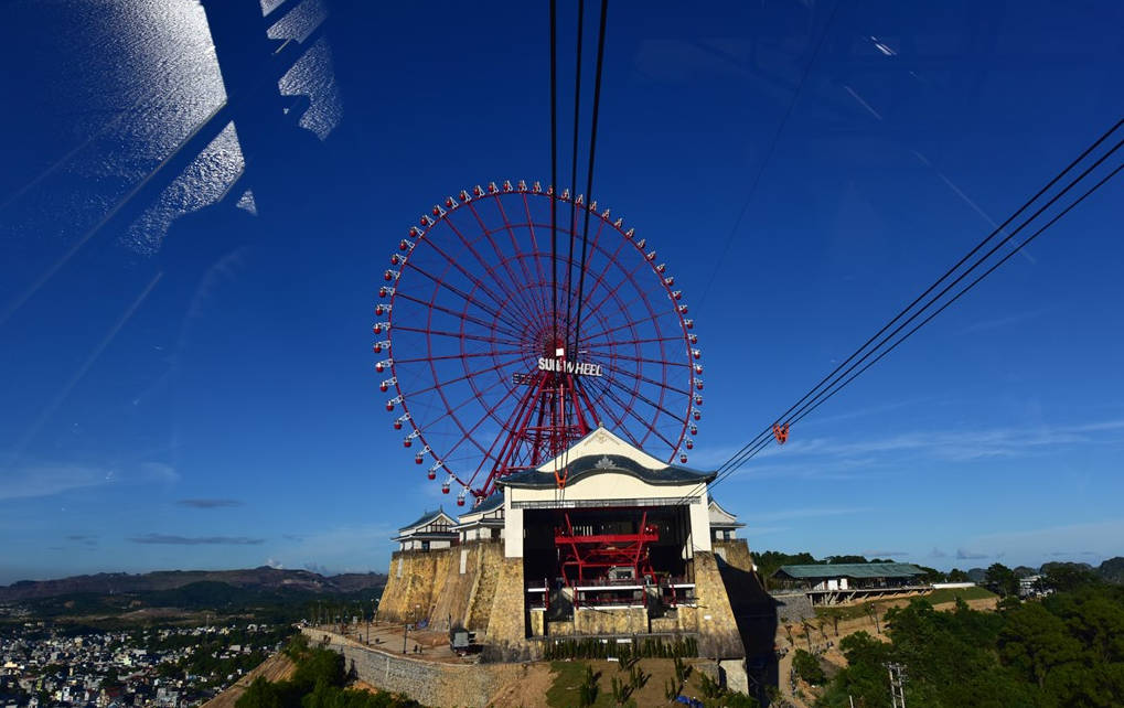Picture 12 of The 'double-decker bus' cable car floats above Ha Long Bay