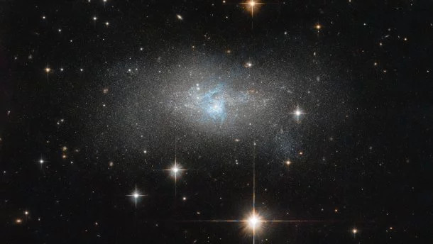 Picture 1 of The glowing galaxy is 28 million light-years from Earth
