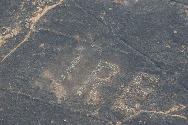 Picture 1 of The hot sun caused a forest fire to reveal a mysterious message from World War II