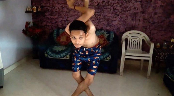 Picture 4 of The Indian boy has a flexible body like rubber, 360 degrees of his shoulders and a 180-degree neck