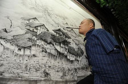 Picture 4 of The man paints with his legs and mouth
