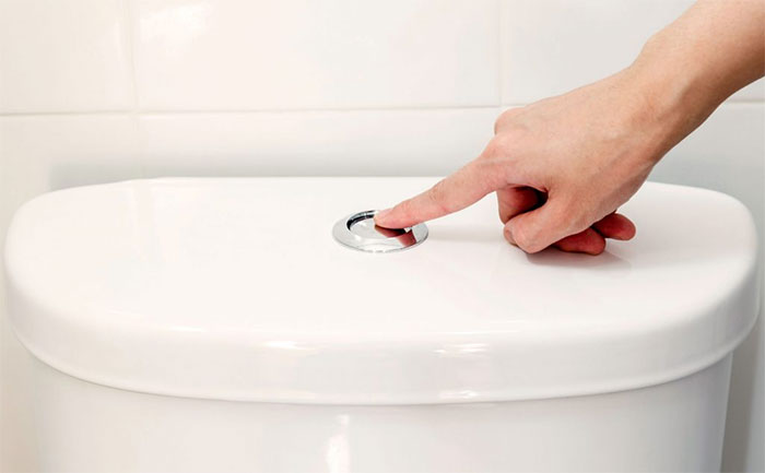 Picture 1 of The new paint helps halve the amount of toilet flush