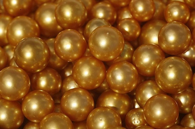 Picture 1 of The past is to display the process of producing rare and precious gold pearls