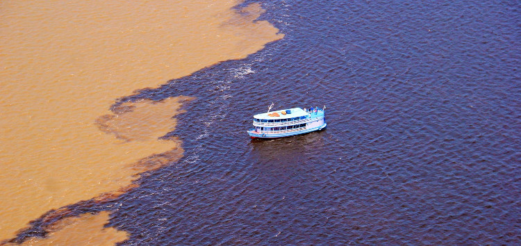 Picture 1 of The river has two colors of water mixed in Brazil