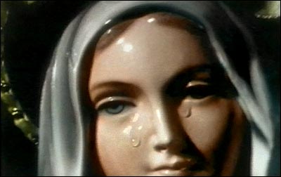 Picture 2 of The times of the Virgin Mary statue tearing up