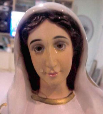 Picture 4 of The times of the Virgin Mary statue tearing up