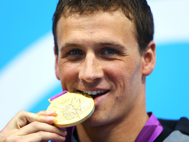 Picture 2 of The unexpected reason after the medal bite of the athletes