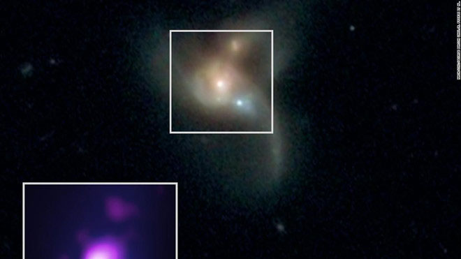 Picture 1 of Three huge black holes are about to collide in the universe