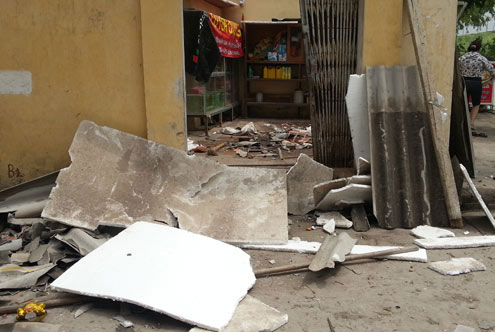 Picture 2 of Tornadoes damaged dozens of houses in Hanoi