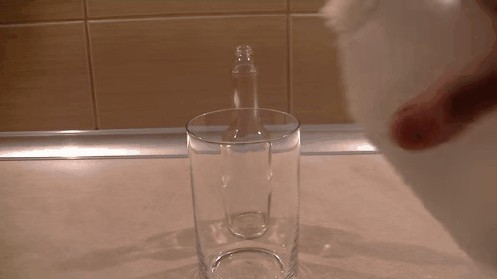 Picture 3 of Try a magic trick with a show of glass bottles disappearing with excitement