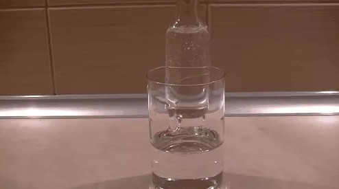 Picture 5 of Try a magic trick with a show of glass bottles disappearing with excitement