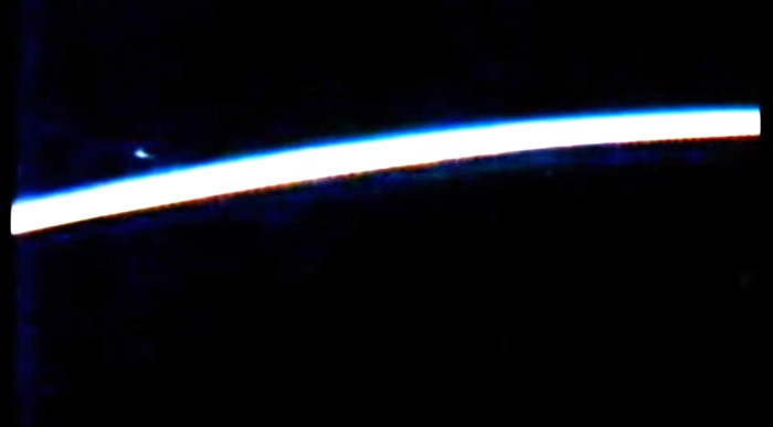 Picture 1 of Video: Blue sphere glows near the ISS station