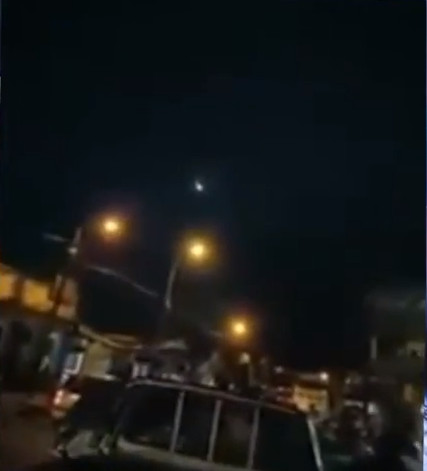 Picture 1 of Video: Mysterious green sphere glows in the sky of South America