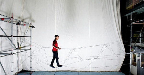 Picture 1 of Video: The drone plane builds a pedestrian bridge