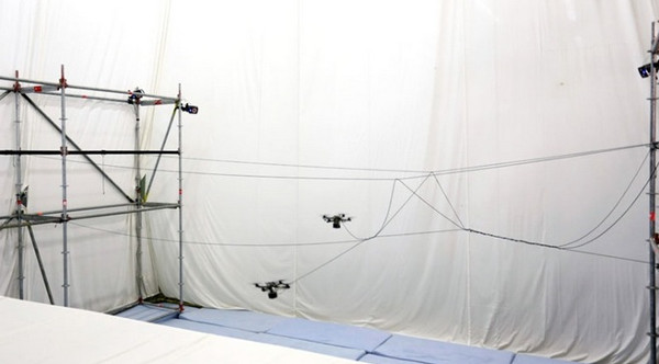 Picture 2 of Video: The drone plane builds a pedestrian bridge