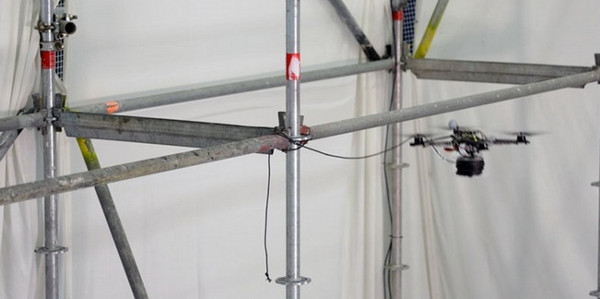 Picture 4 of Video: The drone plane builds a pedestrian bridge