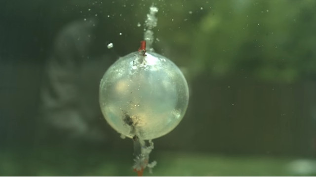 Picture 1 of Video: The explosion in the water creates a brilliant fireball