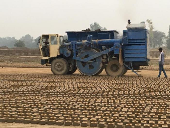Picture 1 of Video: The 'monster' machine produces 300 bricks per minute