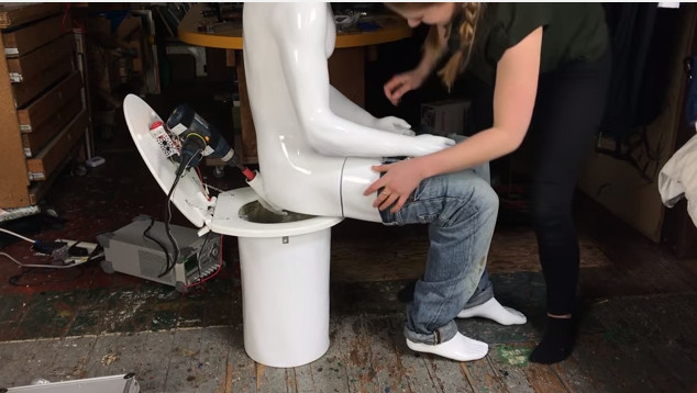 Picture 1 of Video: Youtuber makes a butt-wiping machine