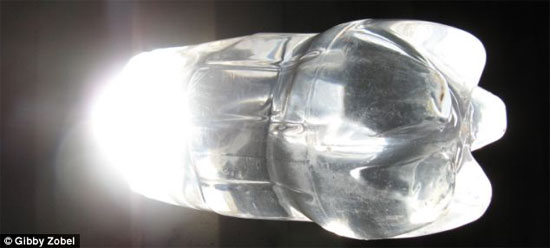 Picture 3 of Water bottle lights illuminate millions of homes