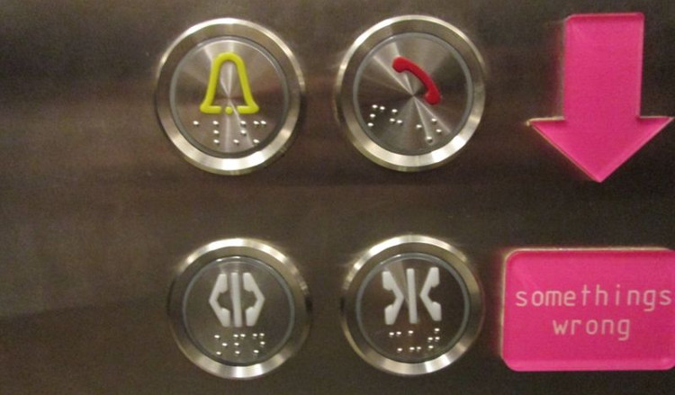 Picture 2 of What is the floating button on the elevator for?