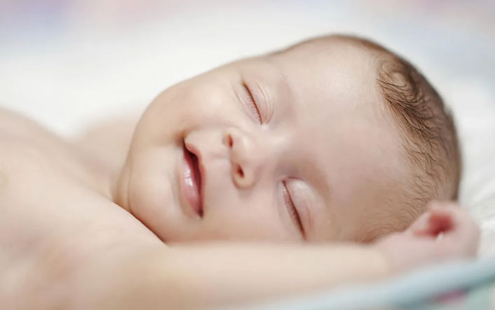 Picture 1 of When can a baby sleep on his stomach?