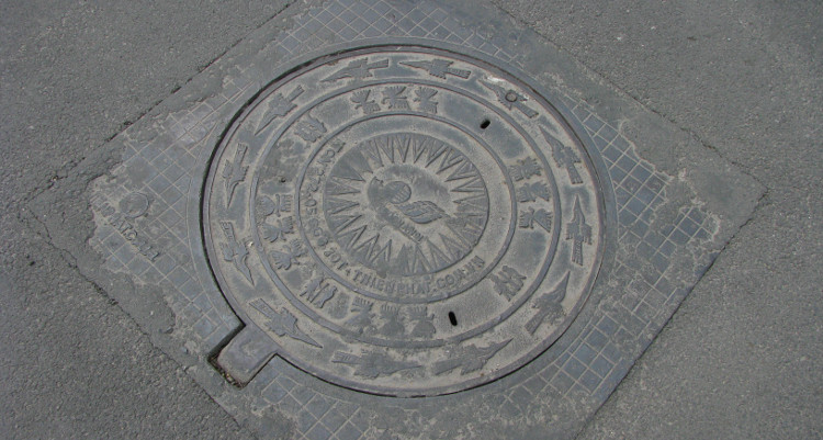Picture 1 of Why are manhole covers designed circularly?