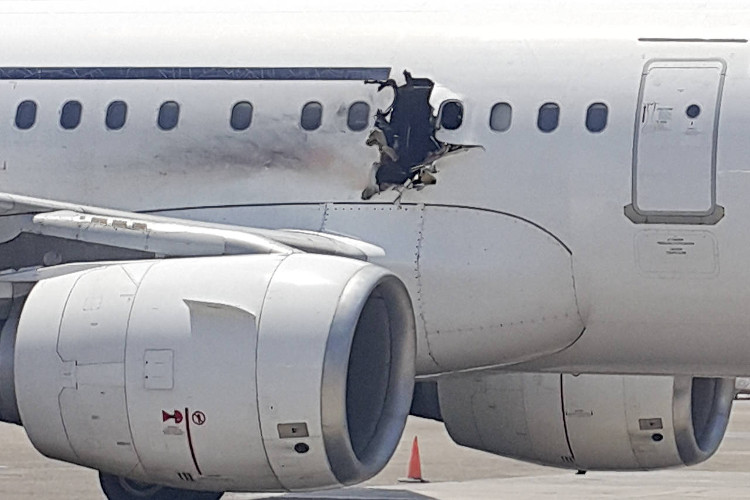 Picture 3 of Why are passengers being sucked out in a plane crash carrying 149 people?