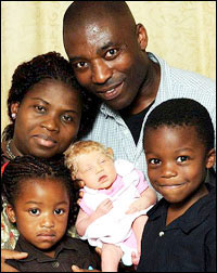 Picture 1 of Why do black parents have blue, white eyes?