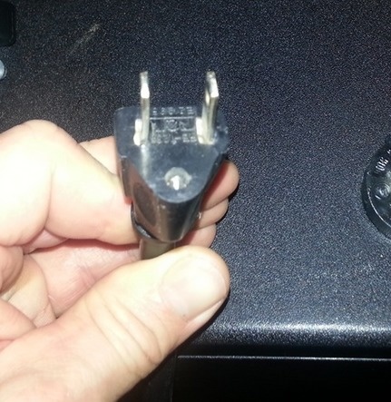 Picture 5 of Why do electrical plugs have to be designed with 3 legs for cumbersome?