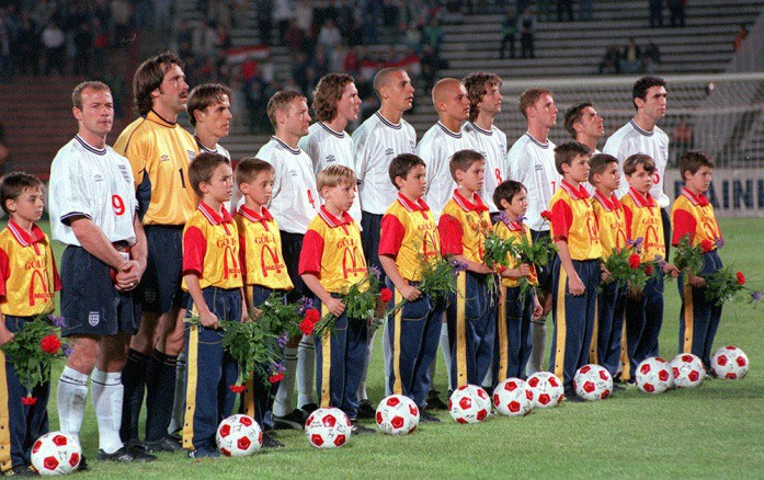 Picture 3 of Why do soccer players always walk out to the yard with children?