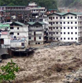 65 people were killed by flooding and landslides in India