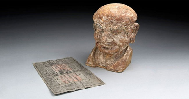 700-year-old paper money hidden in the head of Arhat