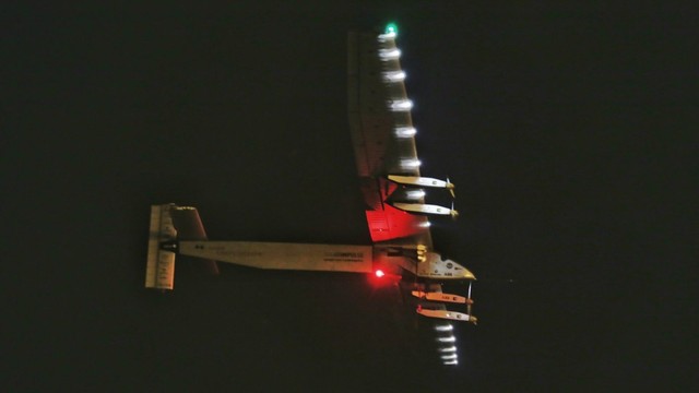A solar plane enters the Pacific Ocean