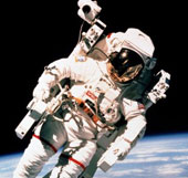 Along the astronaut hovering over the universe
