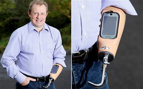 Assemble the phone into the prosthetic arm