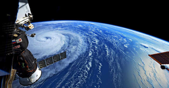 Astronaut shooting super typhoon sweeping the Pacific Ocean