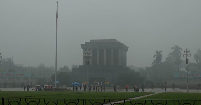 Beams: Near noon, Hanoi fades in a dense fog