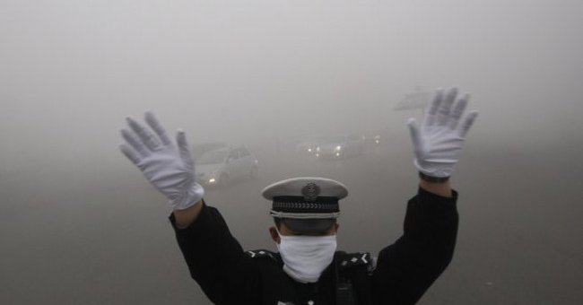 Beijing for the first time warned about air pollution
